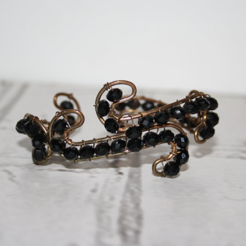 Beautiful gold wire and black beaded cuff bracelet one size
